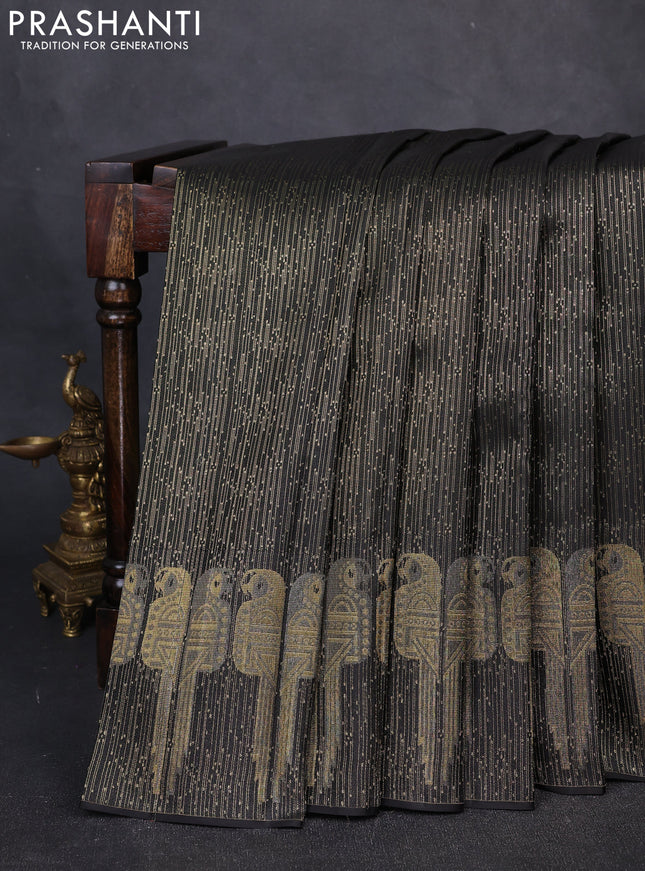 Pure kanchipuram silk saree black with allover zari woven brocade weaves and long parrot design zari woven border