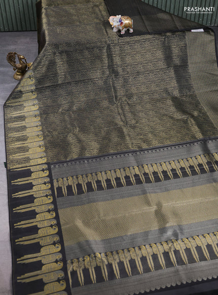 Pure kanchipuram silk saree black with allover zari woven brocade weaves and long parrot design zari woven border