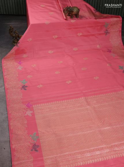 Pure kanchipuram silk saree peach with silver zari woven buttas and rich zari woven border
