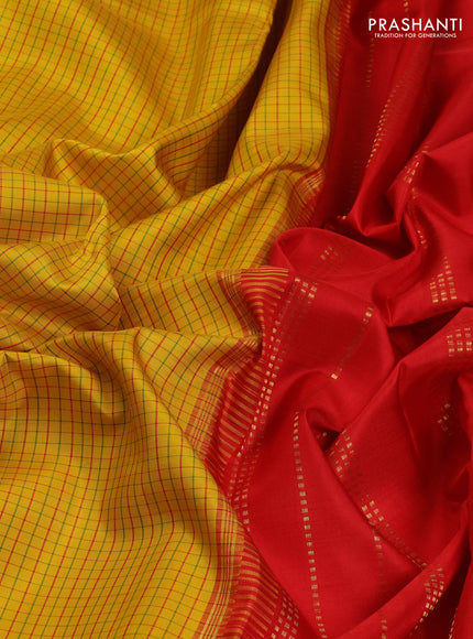 Pure kanchipuram silk saree yellow and red with allover small checked pattern and temple design rettapet zari woven border