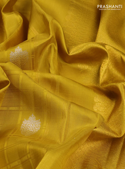 Pure kanchipuram silk saree lime yellow with allover self emboss & zari buttas and rich zari woven border