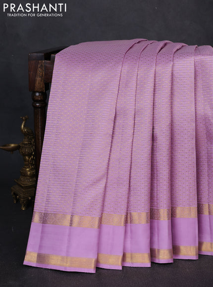 Pure kanchipuram silk saree lavender with allover zari small checks & buttas and rettapet zari woven border