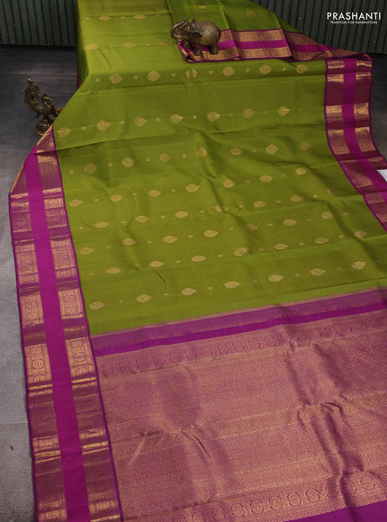 Pure kanchipuram silk saree mehendi green and purple with zari woven buttas and rettapet zari woven border