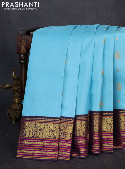 Pure kanchipuram silk saree light blue and jamun shade with zari woven buttas and zari woven korvai border