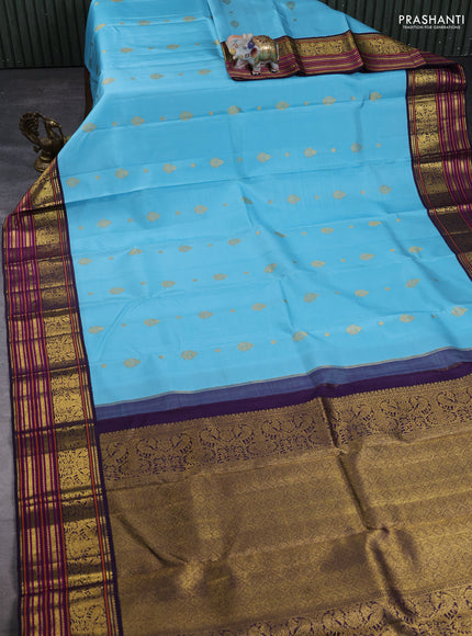 Pure kanchipuram silk saree light blue and jamun shade with zari woven buttas and zari woven korvai border