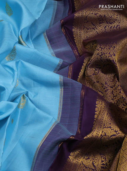 Pure kanchipuram silk saree light blue and jamun shade with zari woven buttas and zari woven korvai border