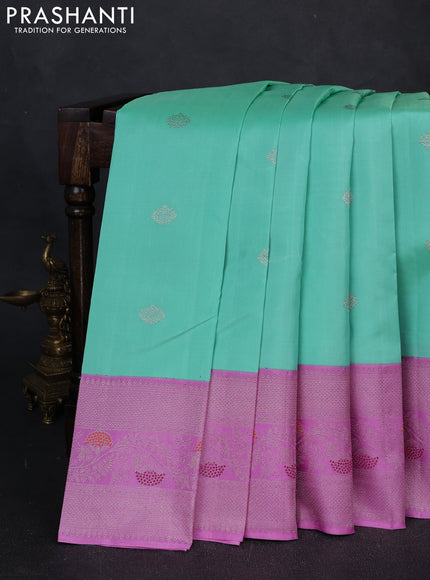 Pure kanchipuram silk saree teal and mild lavender with silver zari woven buttas and rich silver zari woven border