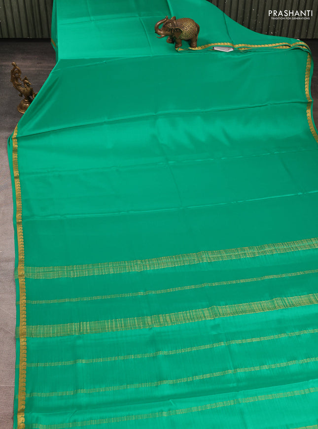 Pure mysore silk saree teal green with plain body and paisley zari woven border