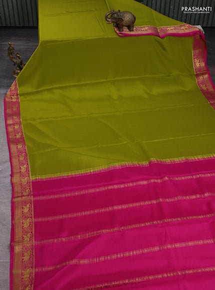 Pure mysore silk saree light green and pink with plain body and elephant zari woven border