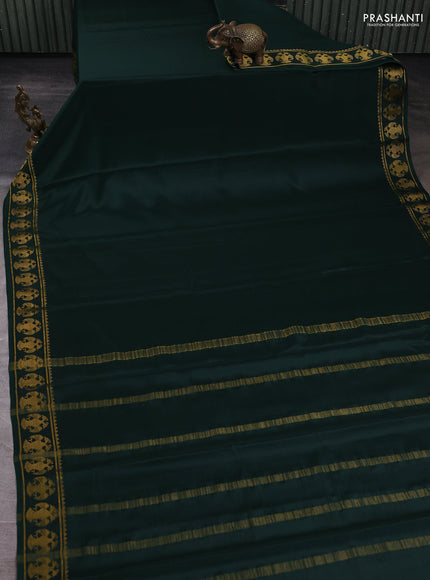 Pure mysore silk saree bottle green with plain body and zari woven border
