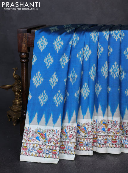 Pochampally silk saree cs blue and off white with allover ikat butta weaves and temple design madhubani printed border