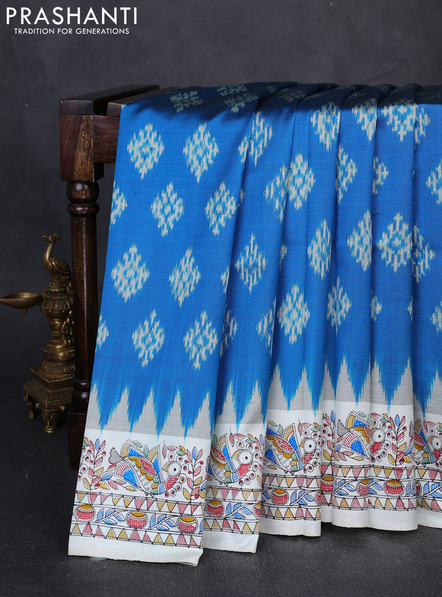 Pochampally silk saree cs blue and off white with allover ikat butta weaves and temple design madhubani printed border