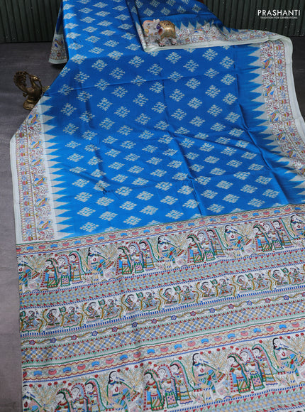 Pochampally silk saree cs blue and off white with allover ikat butta weaves and temple design madhubani printed border