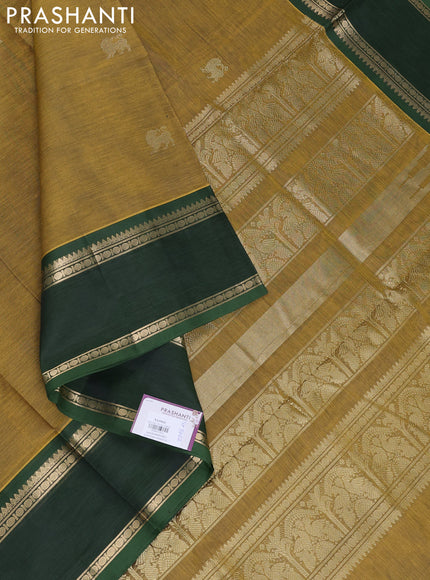 Kanchipuram silk cotton saree dark mustard and green with zari woven buttas and rettapet zari woven border