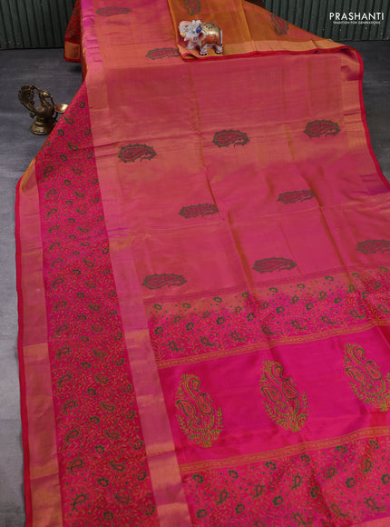 Pure uppada block printed silk saree dual tone pinkish yellow and pink with paisley butta prints and long zari woven printed border