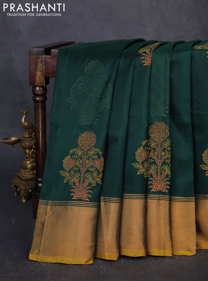 Pure uppada block printed silk saree bottle green and dark mustard with butta prints and zari woven border