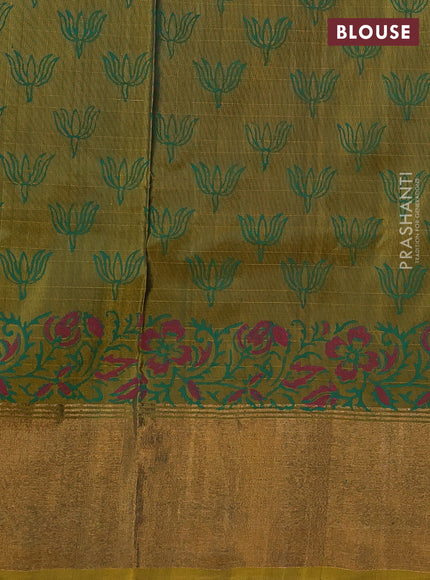 Pure uppada block printed silk saree bottle green and dark mustard with butta prints and zari woven border