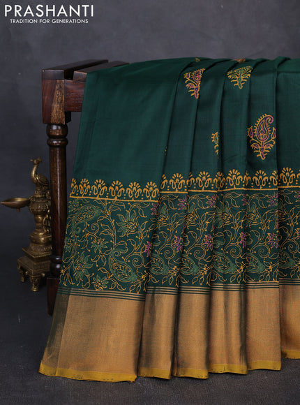 Pure uppada block printed silk saree bottle green and dark mustard with butta prints and printed zari woven border