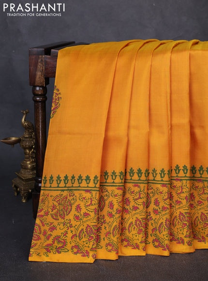 Pure uppada block printed silk saree mango yellow with butta prints and kalamkari printed border