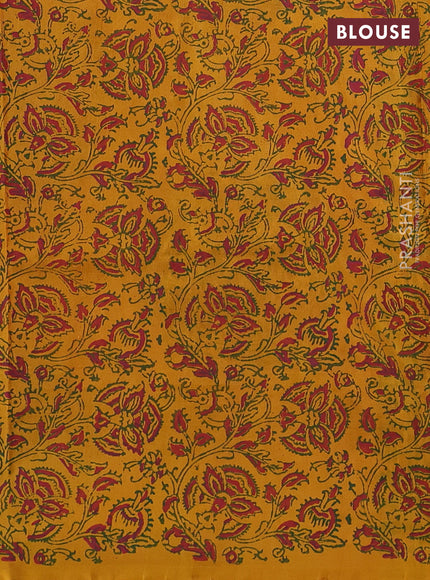 Pure uppada block printed silk saree mango yellow with butta prints and kalamkari printed border