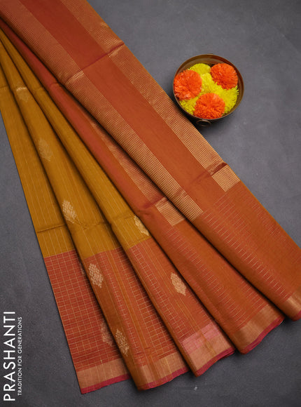 Kora silk cotton saree mustard yellow and dual tone pink with allover zari stripes & buttas and long zari woven checked border