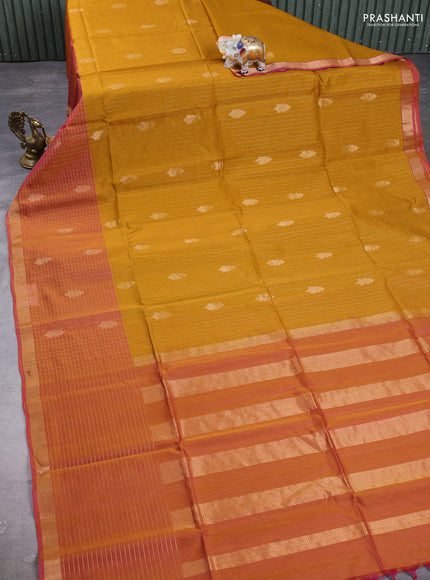 Kora silk cotton saree mustard yellow and dual tone pink with allover zari stripes & buttas and long zari woven checked border