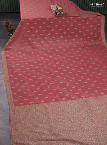 Banarasi semi crepe saree peach with allover thread & zari woven buttas and woven border