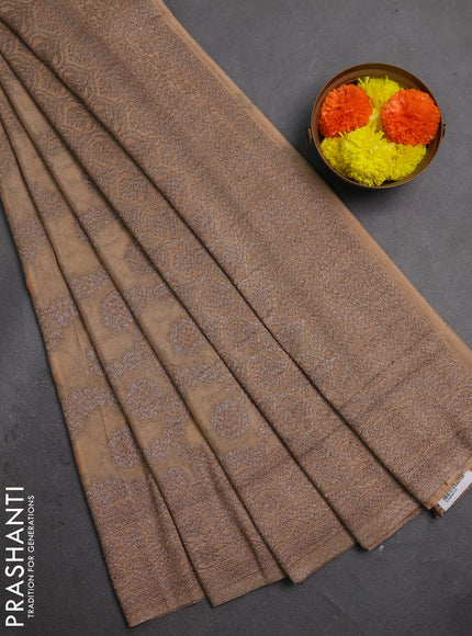 Banarasi semi crepe saree beige with allover thread & zari weaves and woven border