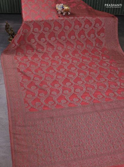 Banarasi semi crepe saree peach with allover thread & zari weaves and woven border