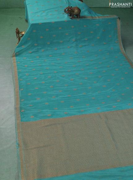 Banarasi semi crepe saree teal blue with allover thread & zari woven buttas and woven border