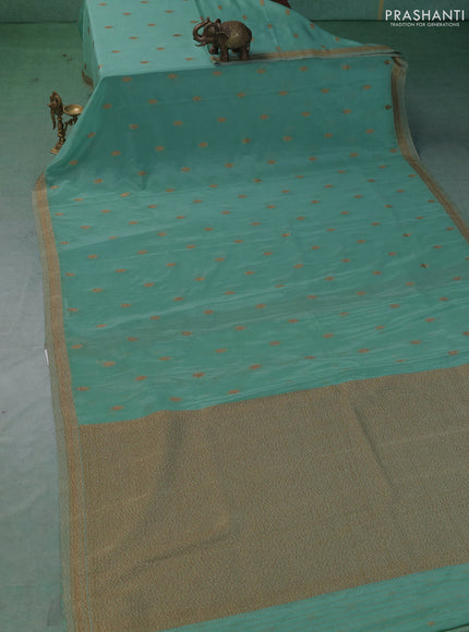 Banarasi semi crepe saree mild teal green with allover thread & zari woven buttas and woven border
