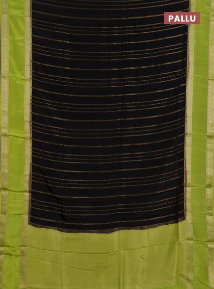 Semi mysore silk saree black and light green with allover zari weaves and rettapet zari woven border