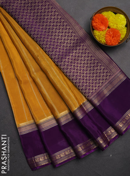 Semi mysore silk saree mustard yellow and violet with allover zari weaves and rettapet zari woven border