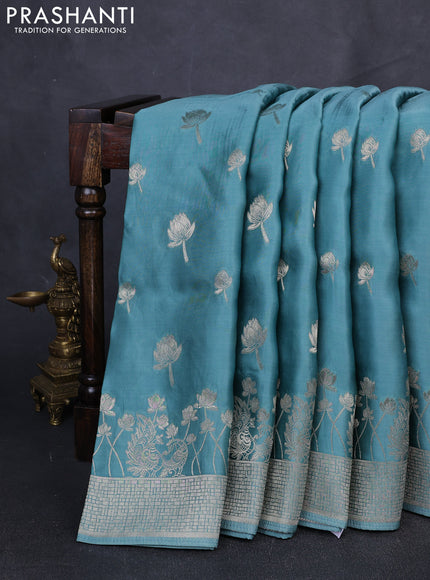 Banarasi silk saree pastel green with zari woven buttas and rich zari woven border