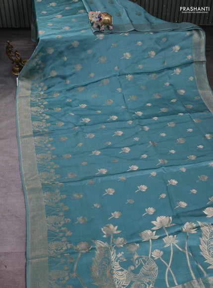 Banarasi silk saree pastel green with zari woven buttas and rich zari woven border
