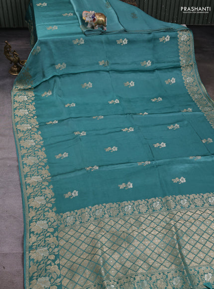 Banarasi silk saree teal green with zari woven floral buttas and floral design border