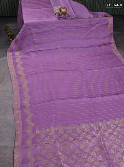 Banarasi silk saree lavender with allover zari wevaes and rich zari woven border