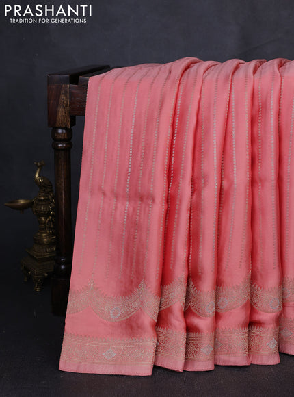 Banarasi silk saree peach orange with allover zari wevaes and rich zari woven border