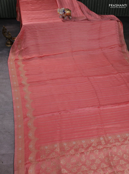Banarasi silk saree peach orange with allover zari wevaes and rich zari woven border