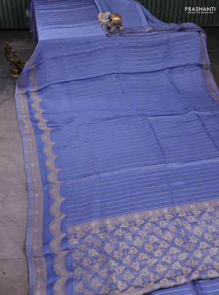 Banarasi silk saree pastel blue with allover zari wevaes and rich zari woven border