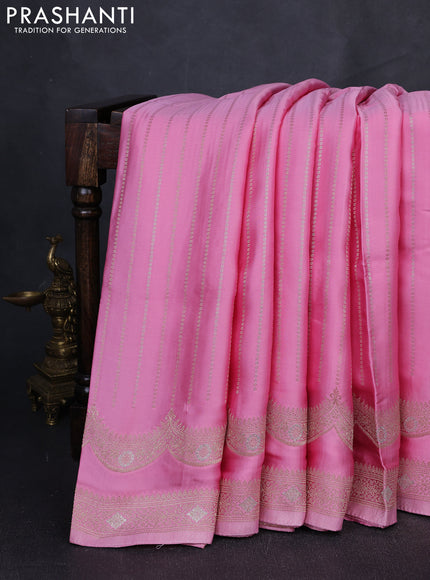 Banarasi silk saree light pink with allover zari wevaes and rich zari woven border