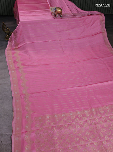Banarasi silk saree light pink with allover zari wevaes and rich zari woven border