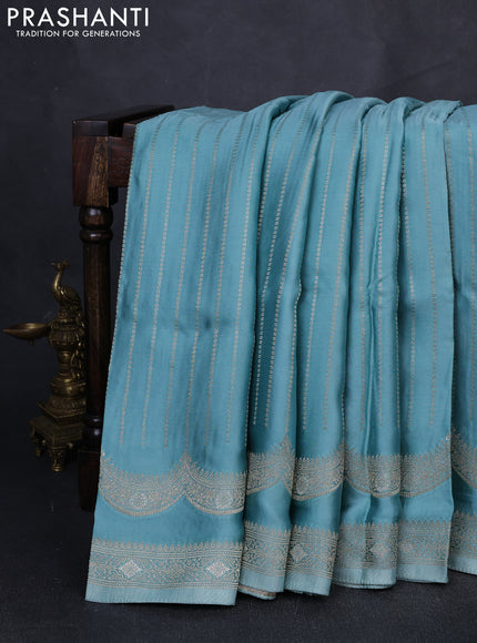 Banarasi silk saree Pastel blue with allover zari wevaes and rich zari woven border