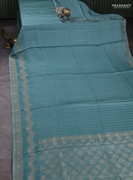 Banarasi silk saree Pastel blue with allover zari wevaes and rich zari woven border