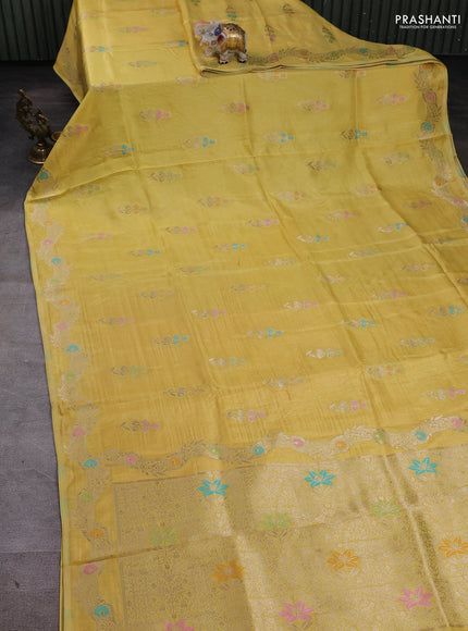 Banarasi silk saree yellow with floral zari woven buttas and rich zari woven border