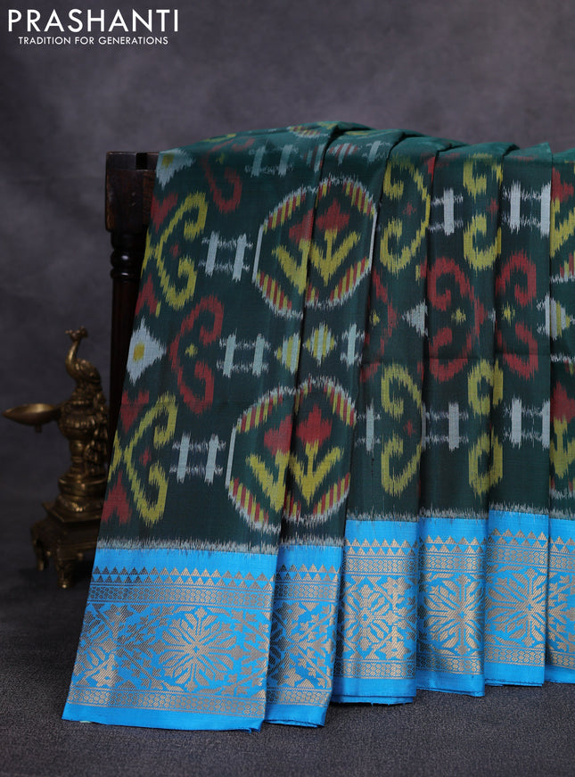 Ikat soft silk saree green and cs blue with allover ikat weaves and zari woven border