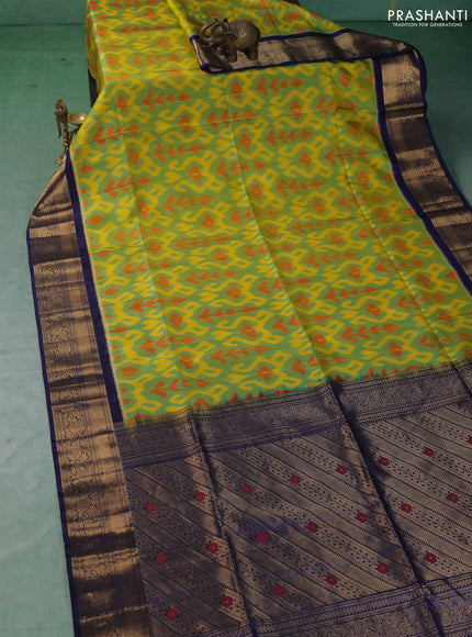 Ikat soft silk saree teal green and navy blue with allover ikat weaves and zari woven border