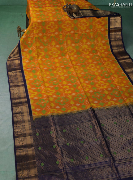 Ikat soft silk saree mango yellow and navy blue with allover ikat weaves and zari woven border