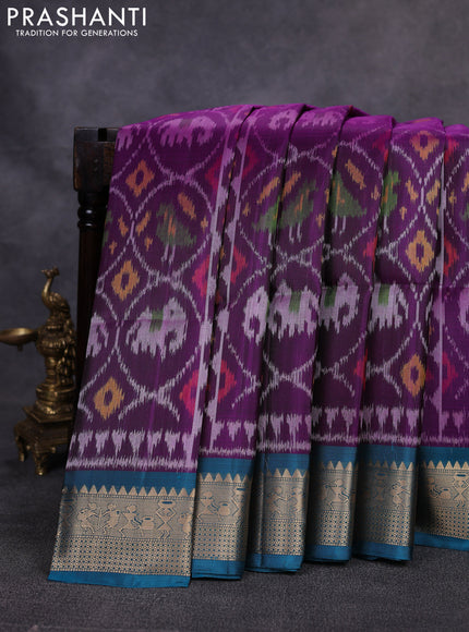 Ikat soft silk saree deep purple and peacock green with allover ikat weaves and zari woven border