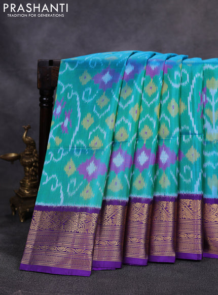 Ikat soft silk saree teal green and violet with allover ikat weaves and zari woven border
